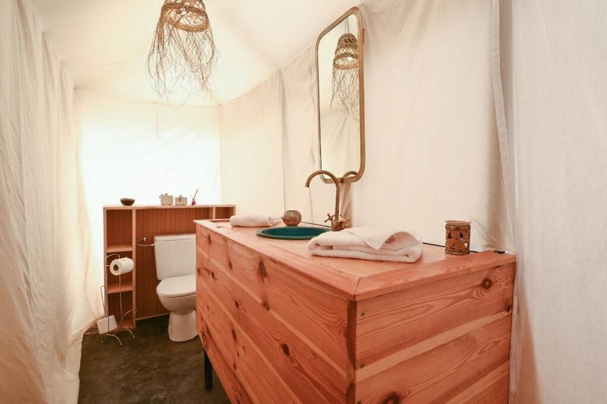 Shower, rainfall showerhead, towels, soap