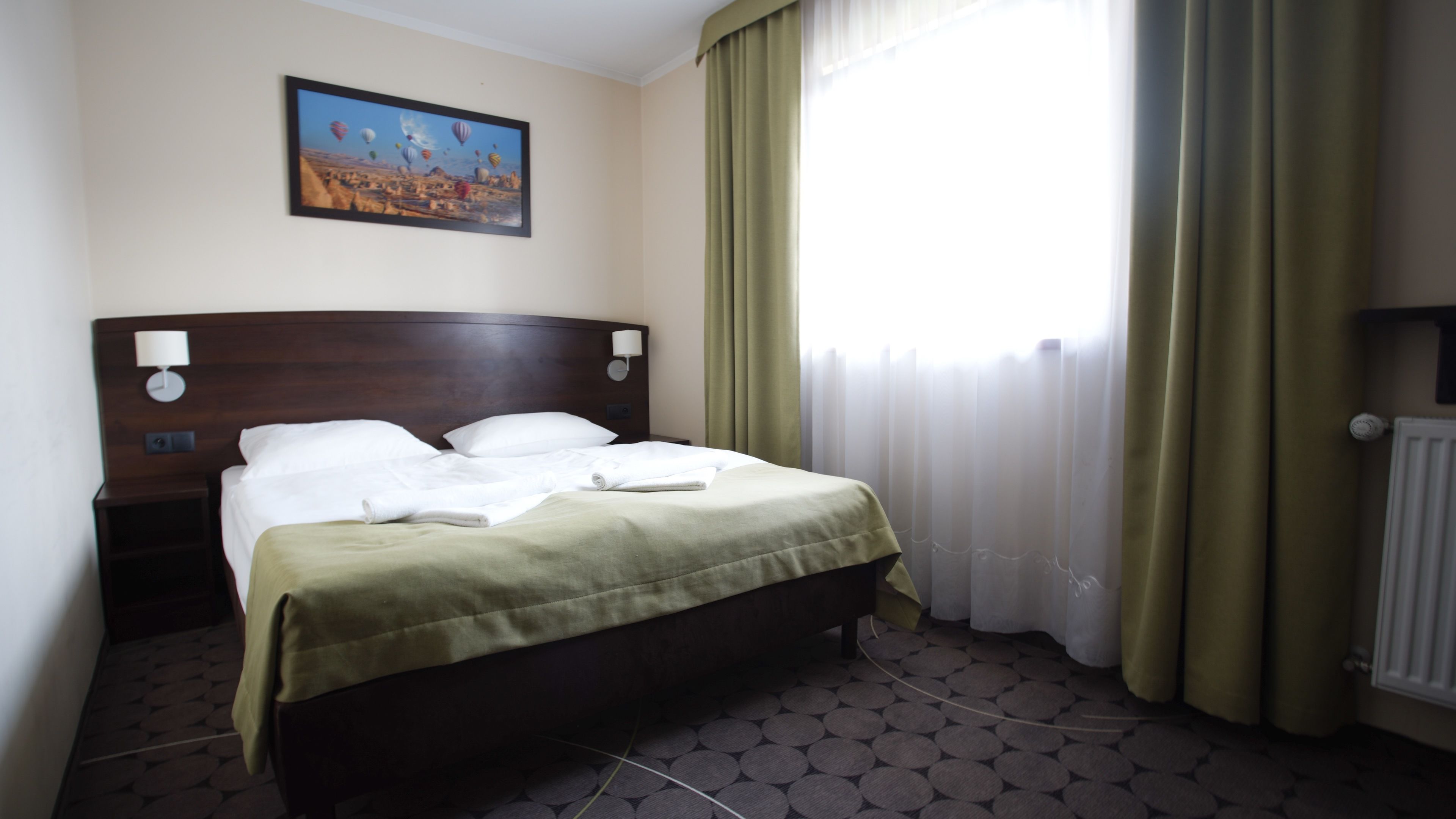 Desk, laptop workspace, blackout curtains, iron/ironing board