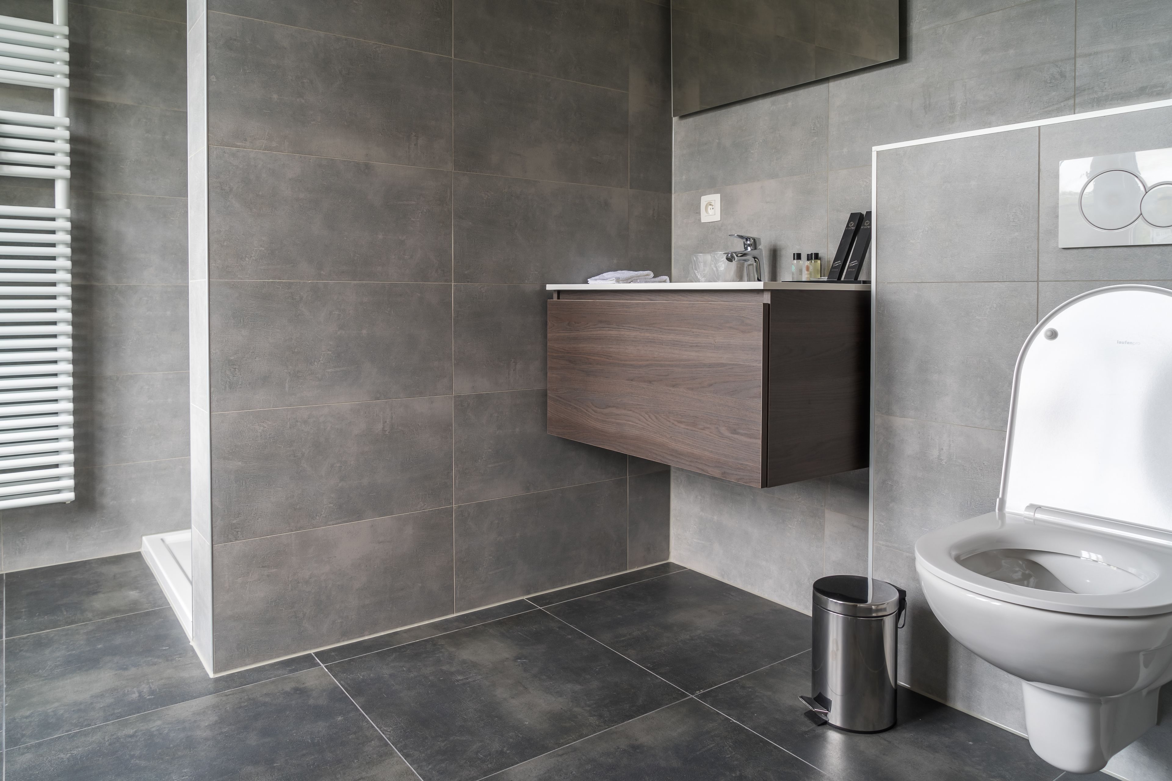 superior room | bathroom | shower, rainfall showerhead, free toiletries, hair dryer