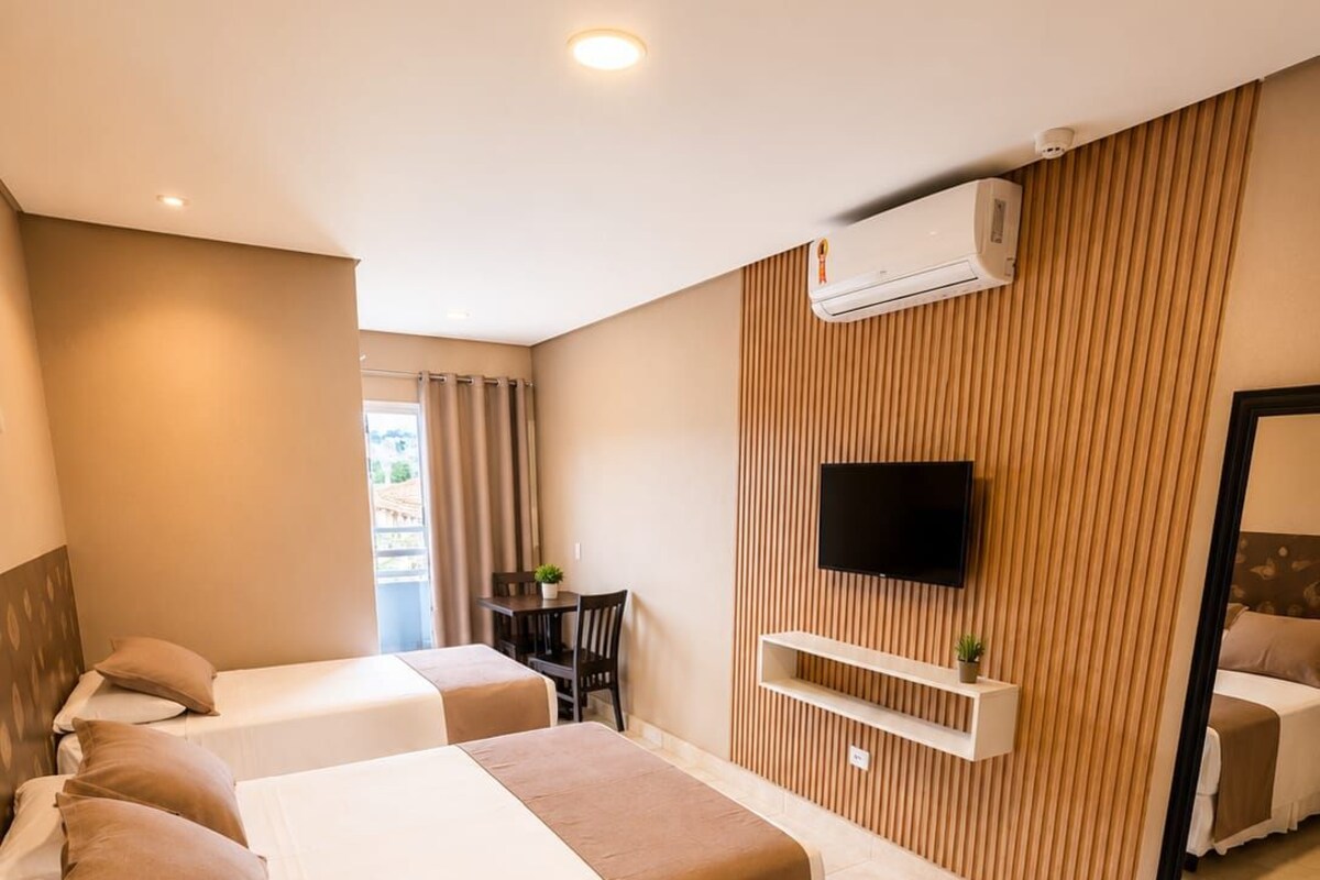 Premium Triple Room, Balcony | Minibar, blackout curtains, free WiFi, bed sheets