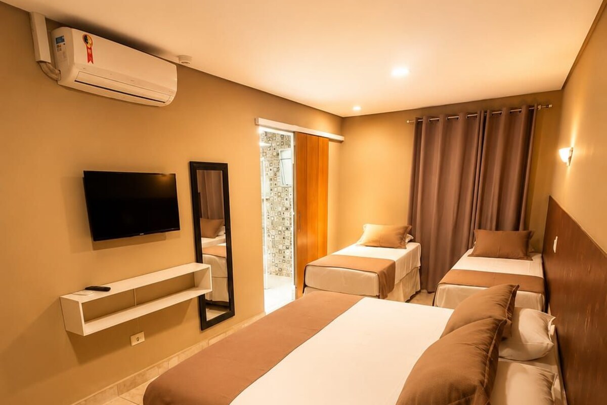 Standard Quadruple Room | Minibar, blackout curtains, free WiFi, bed sheets