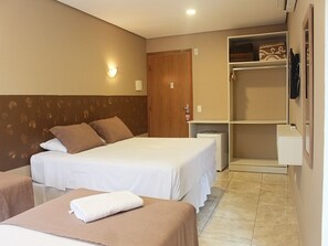 Premium Quadruple Room | Minibar, blackout curtains, free WiFi, bed sheets - Don Marco's Hotel (Guarujá)