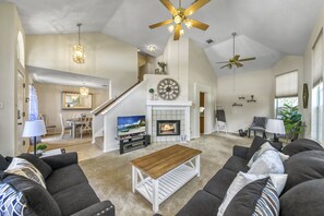 TV, fireplace, books