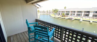 Seaside Escape - Boat Slip and Water View Canal Side Bayhouse Condo!
