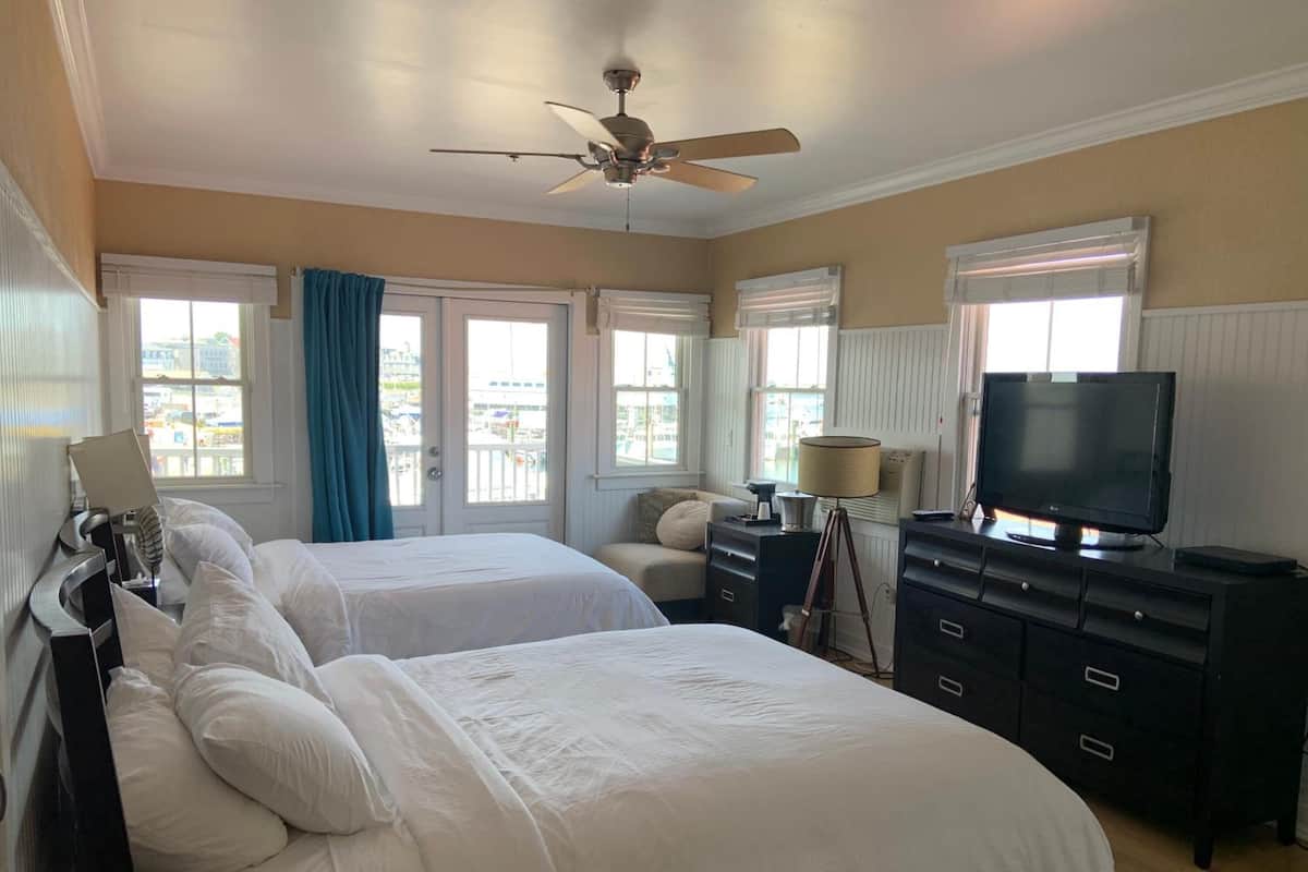 Deluxe Room, 2 Queen Beds | In-room safe, iron/ironing board, free cribs/infant beds, rollaway beds