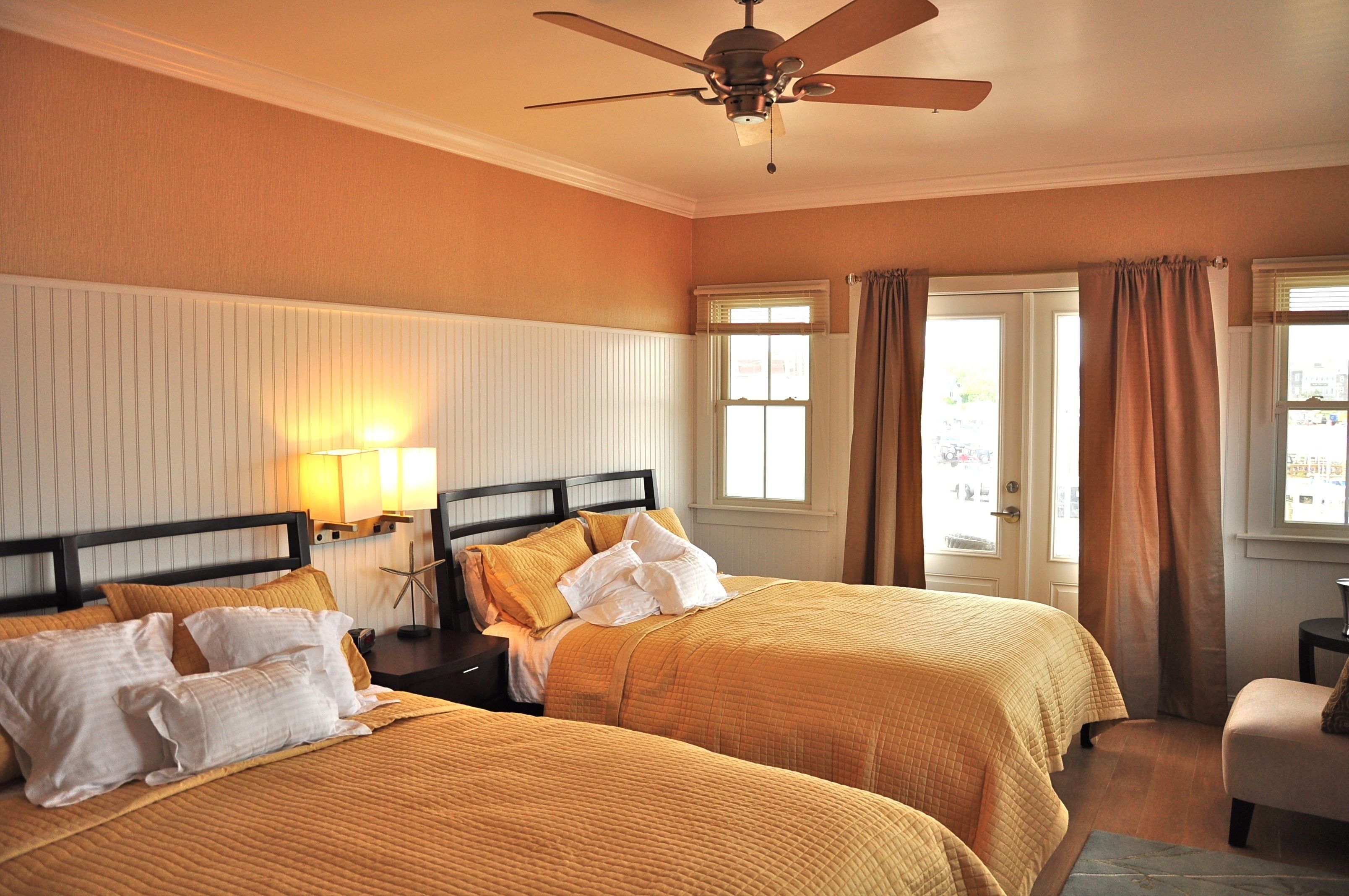 deluxe room, 2 queen beds | 1 bedroom, in-room safe, iron/ironing board, free cots/infant beds