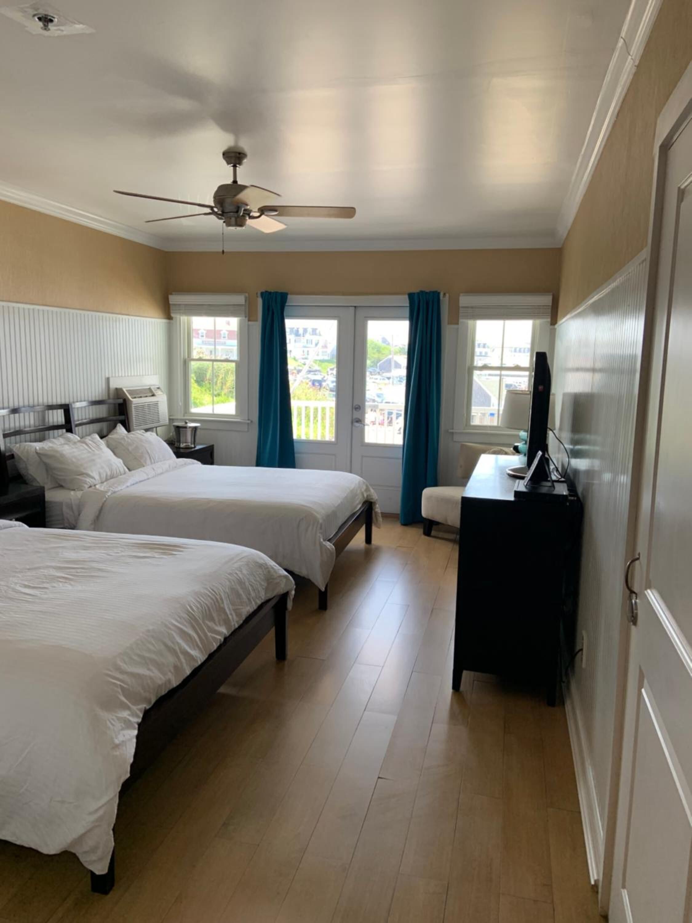 deluxe room, 2 queen beds | 1 bedroom, in-room safe, iron/ironing board, free cots/infant beds