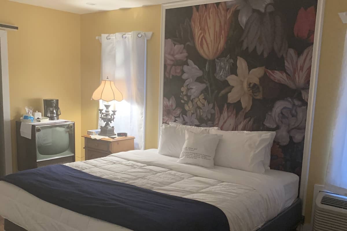 signature room, 1 king bed | egyptian cotton sheets, premium bedding, down duvets, pillow-top beds