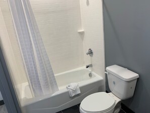 Bathroom shower - Scottish Inns Campus (Fort Worth)