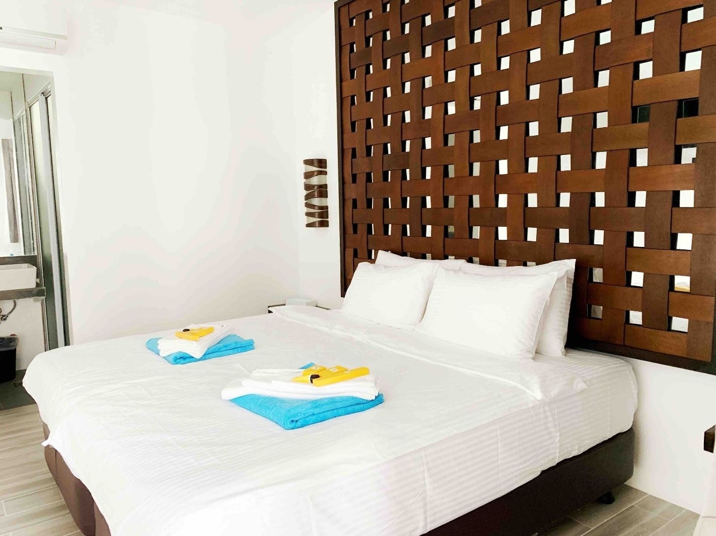 Premium bedding, down comforters, in-room safe, blackout drapes