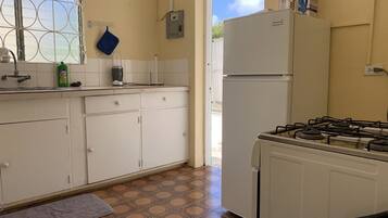Bungalow, 3 Bedrooms, Accessible | Private kitchen | Coffee/tea maker, electric kettle, toaster oven, cleaning supplies