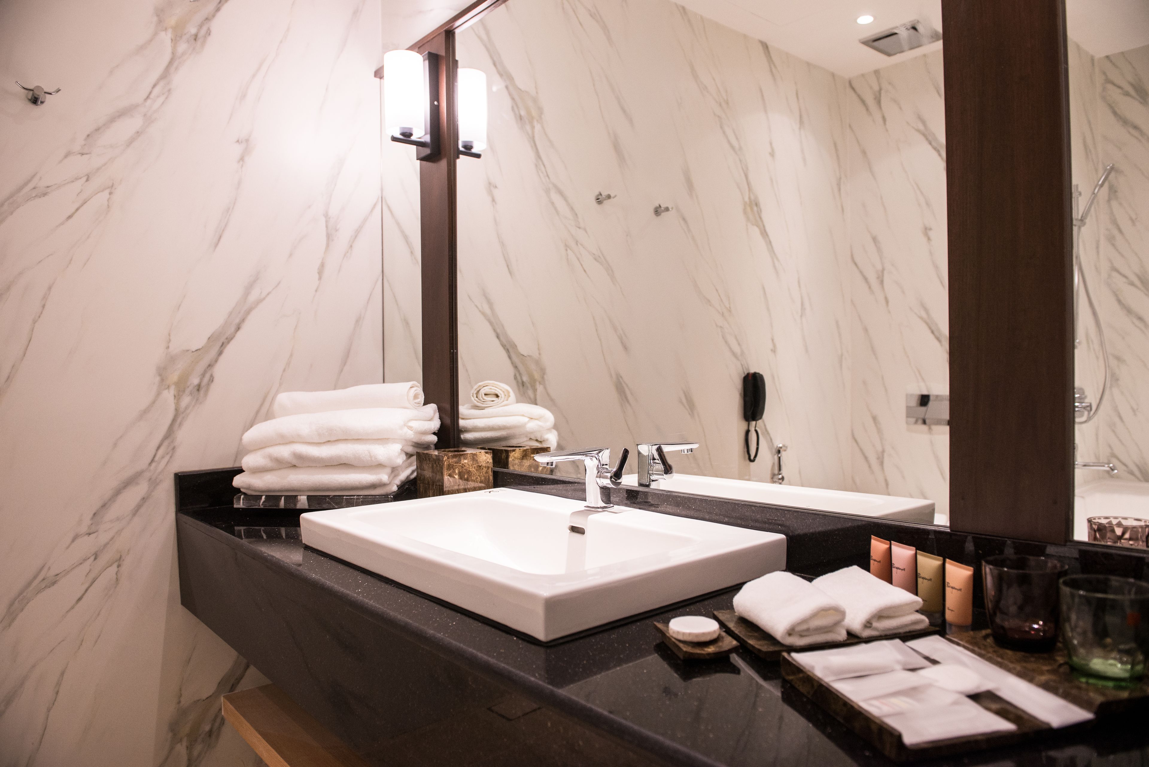 deluxe room | bathroom | shower, free toiletries, hair dryer, bathrobes