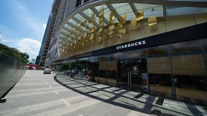 A modern shopping mall with a Starbucks store. - Jaan Apartment 29 Lieu Giai (Hanoi)