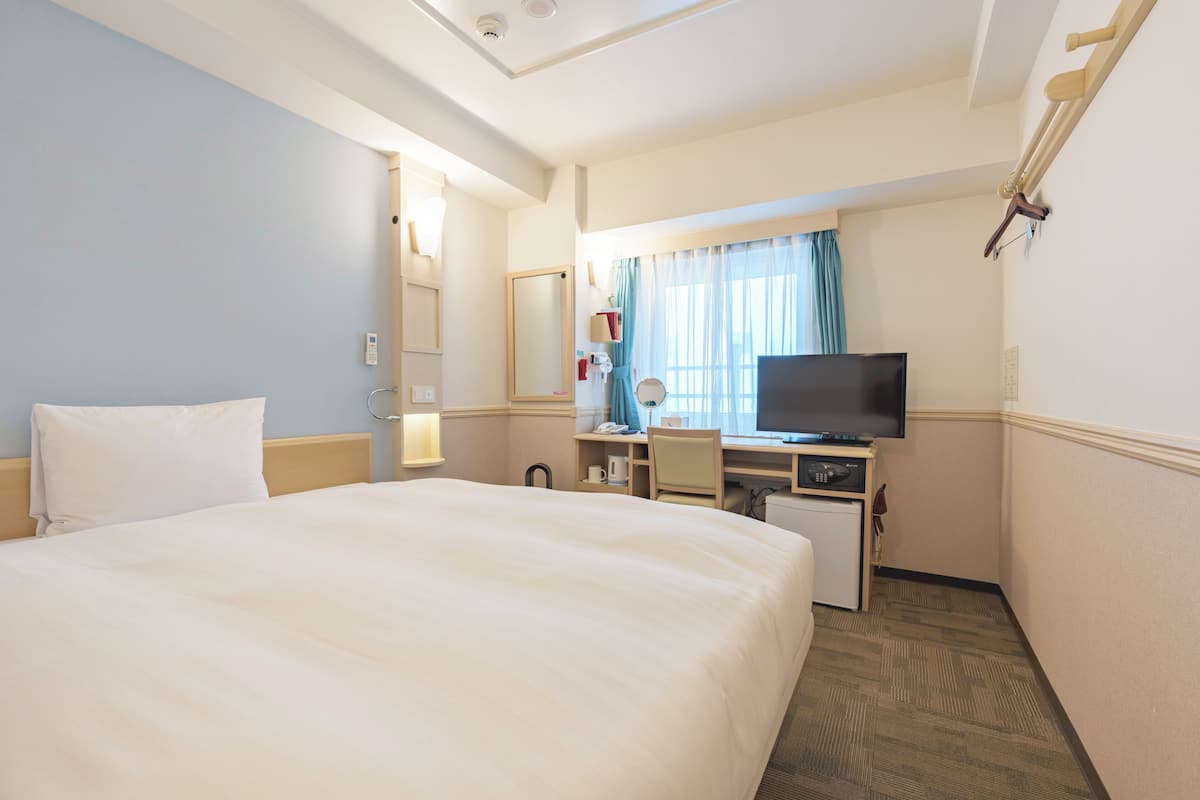 Deluxe-Einzelzimmer | Zimmersafe, Schreibtisch, laptopgeeigneter Arbeitsplatz