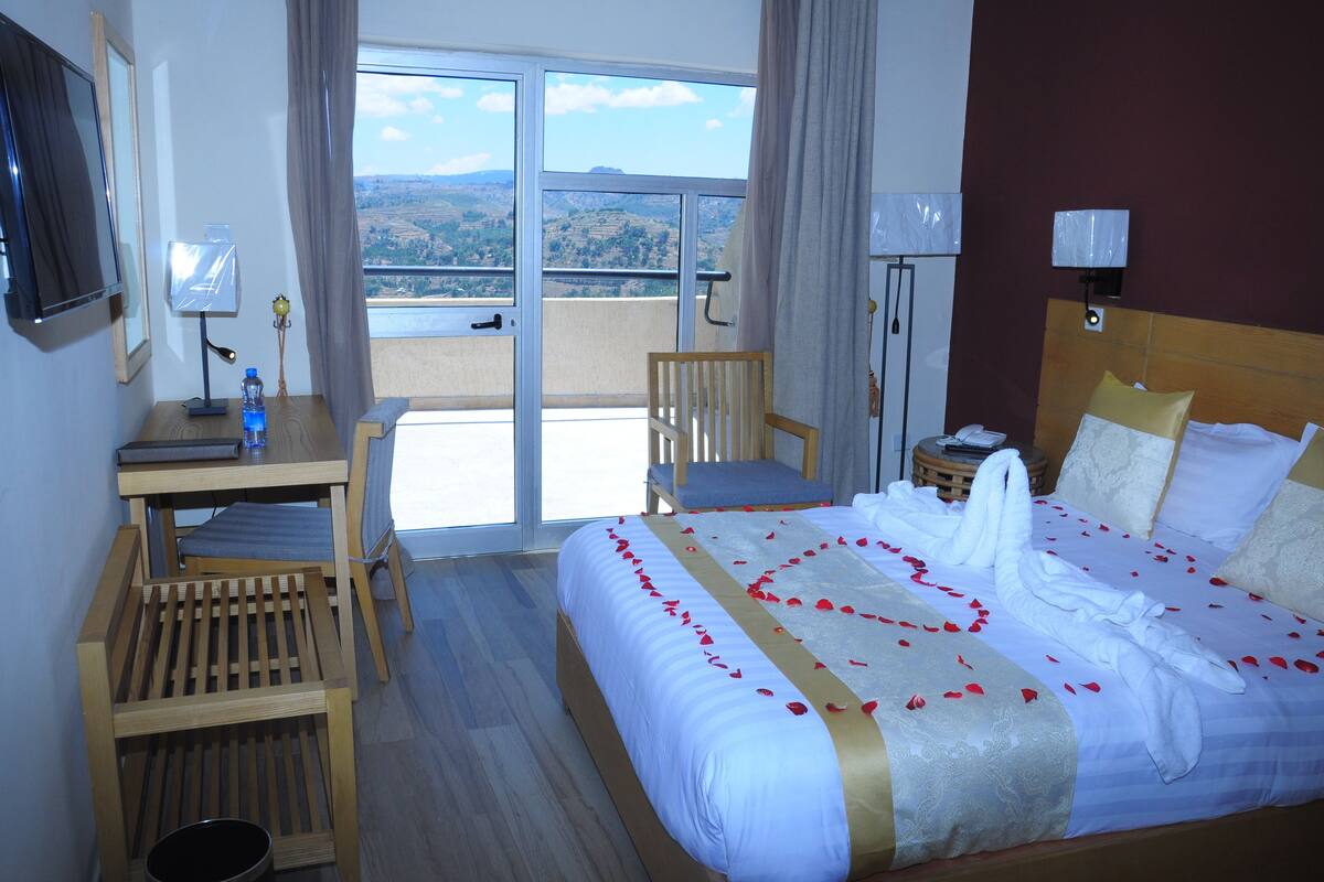 In-room safe, desk, laptop workspace, blackout curtains