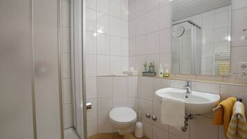 Shower, free toiletries, hair dryer, towels