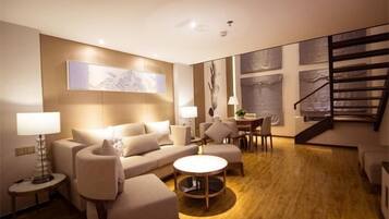 Superior Double Room | Living area | TV