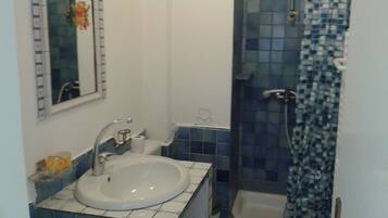 Double Room, Balcony | Bathroom | Shower, rainfall showerhead, towels, soap