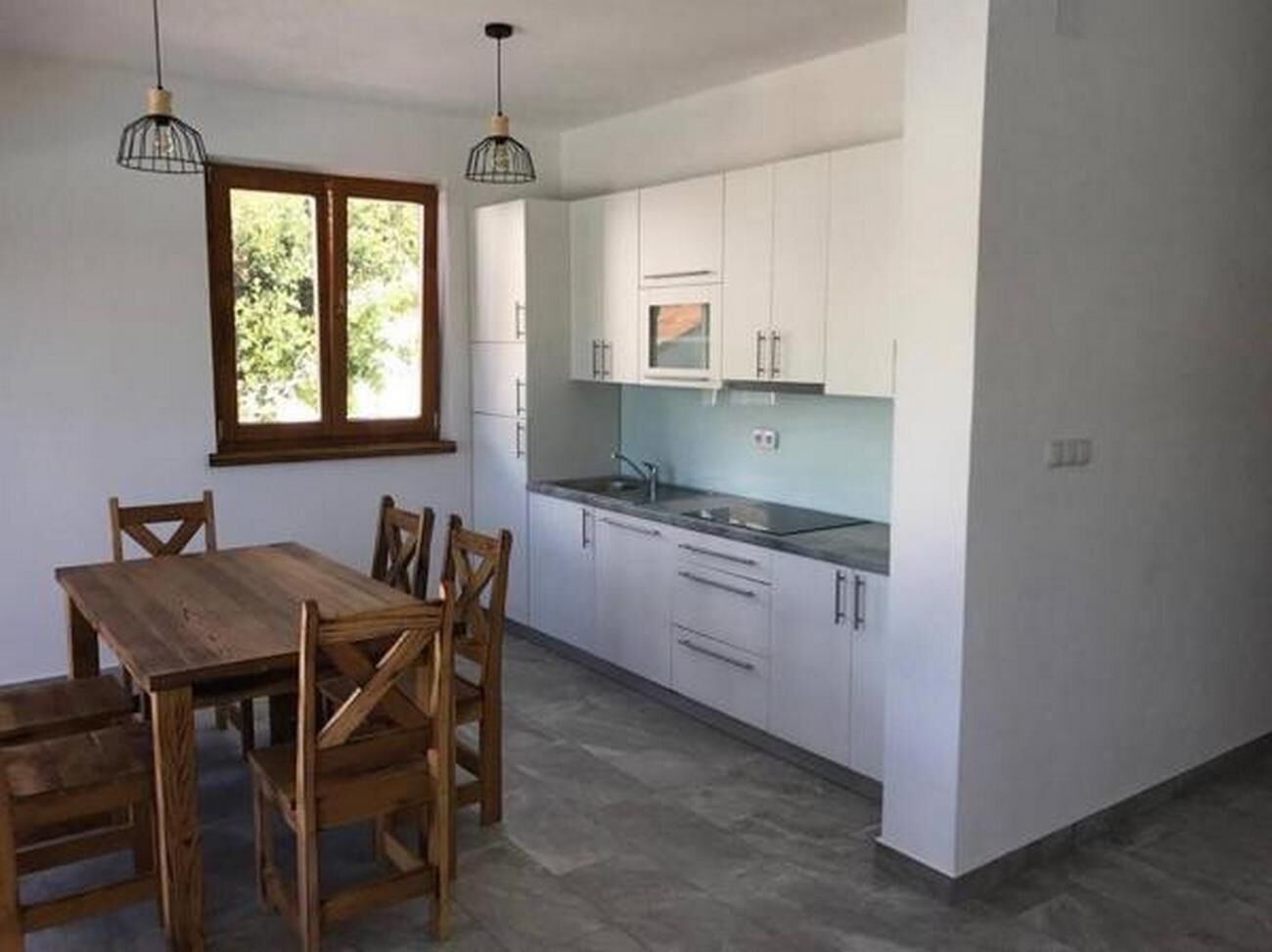 Pool house 1 | Private kitchen | Full-sized fridge, microwave, stovetop, dishwasher