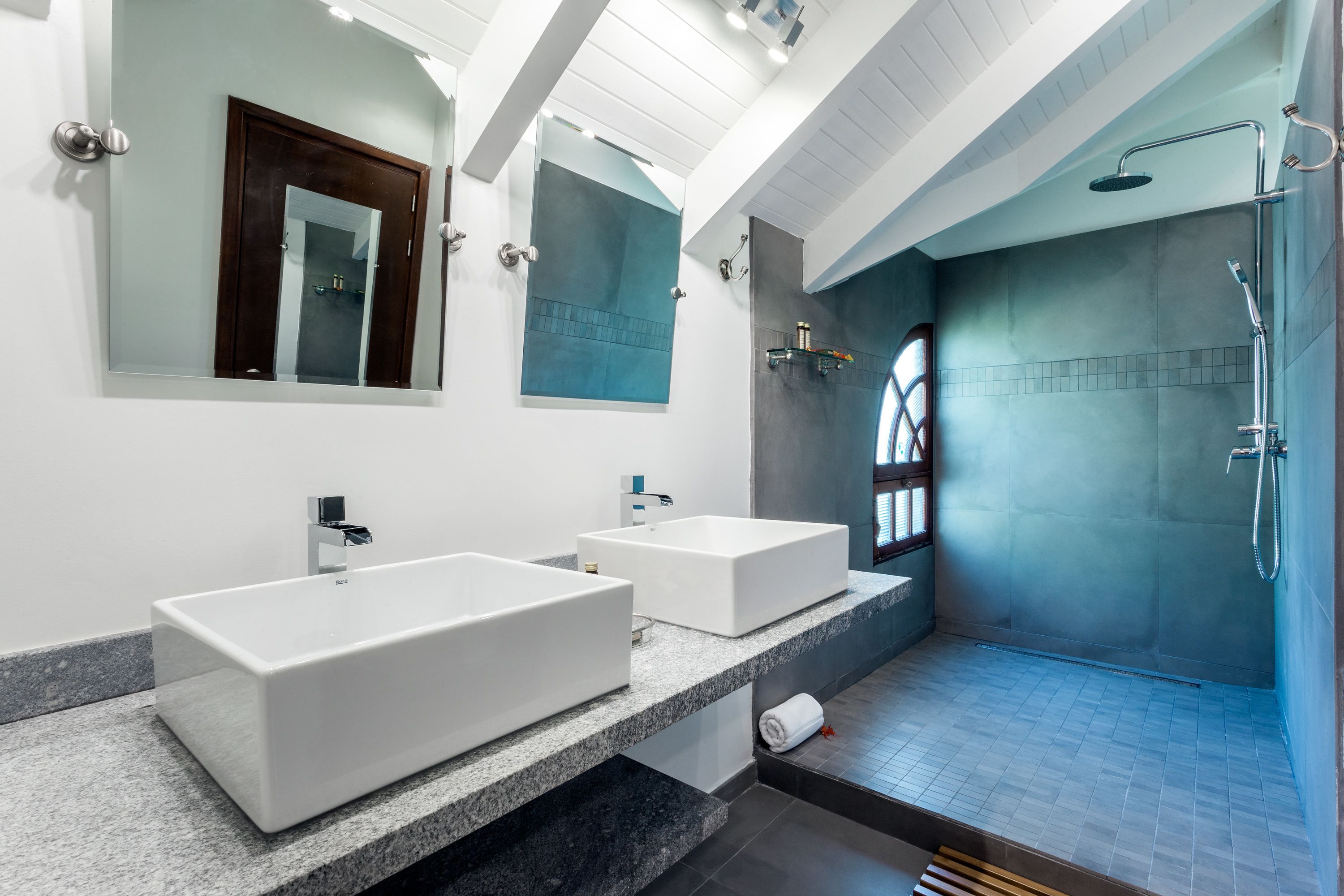 deluxe loft | bathroom | shower, deep-soaking bathtub, rainfall showerhead, designer toiletries