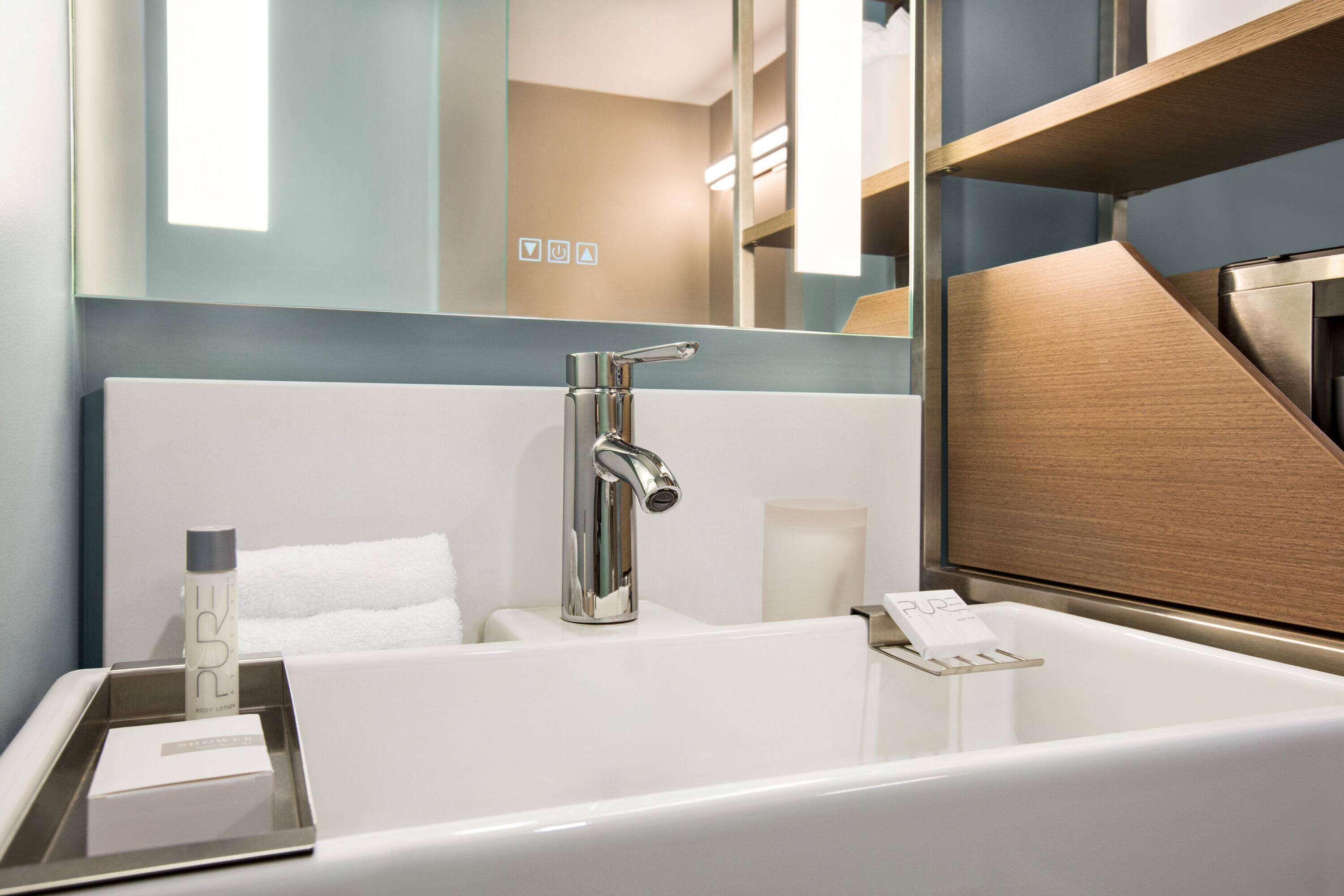 shower, rainfall showerhead, designer toiletries, hair dryer