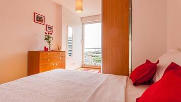 1 bedroom, desk, iron/ironing board, travel crib