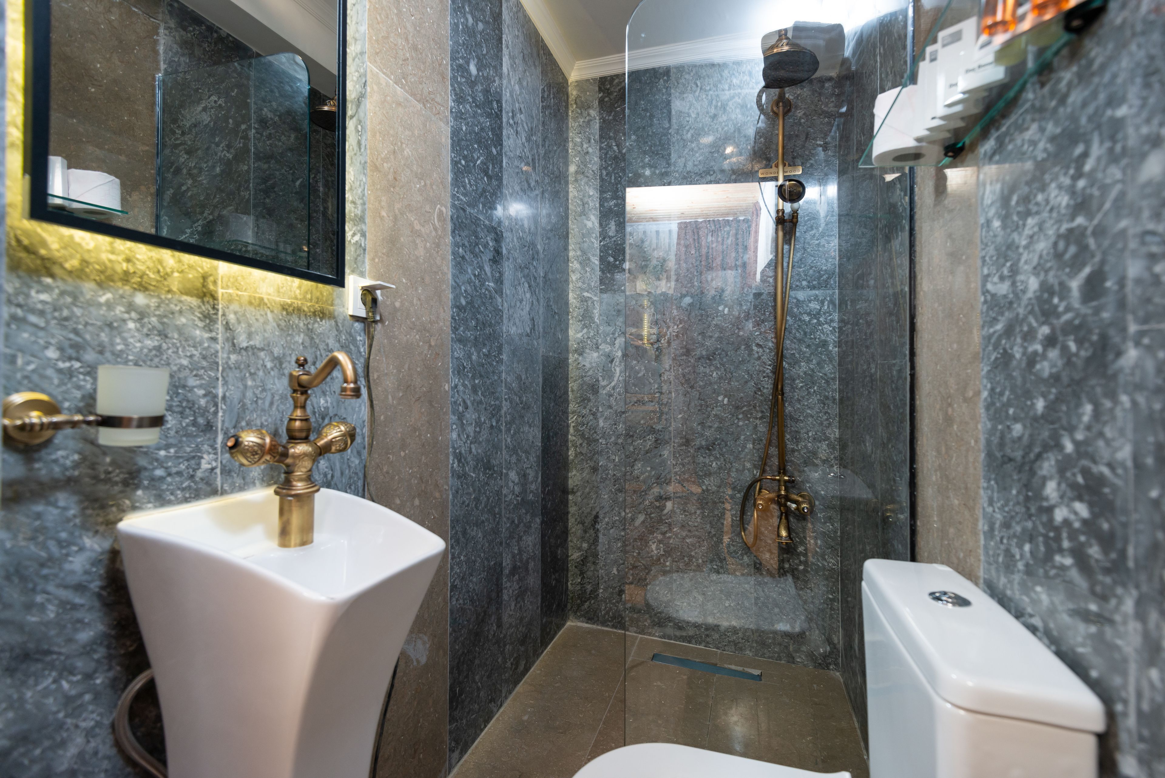 economy double room | bathroom | shower, free toiletries, hair dryer, slippers