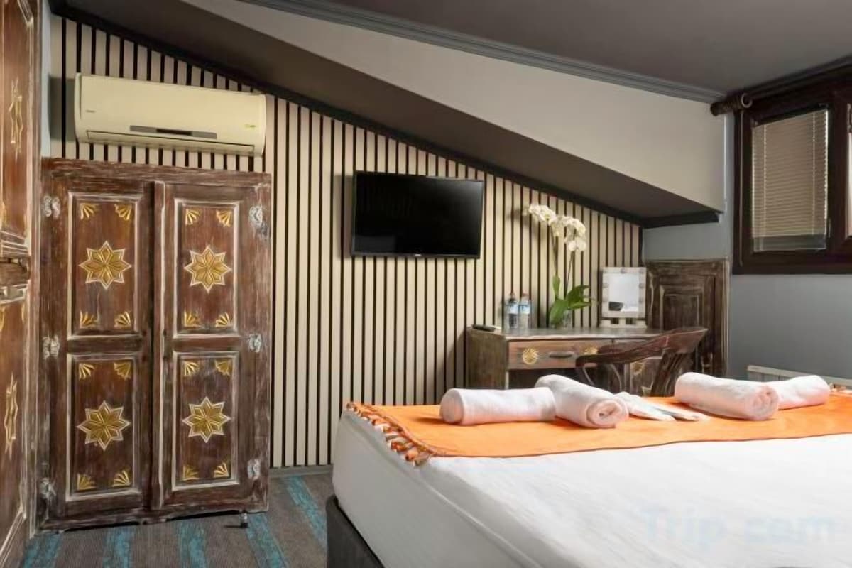 Roupas de cama premium, frigobar (abastecido com alguns itens grátis)