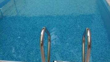 Seasonal outdoor pool, pool umbrellas, sun loungers