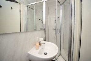Shower, free toiletries, hair dryer, towels