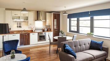 Two Bedroom Apartment | Private kitchen | Full-sized fridge, microwave, oven, dishwasher