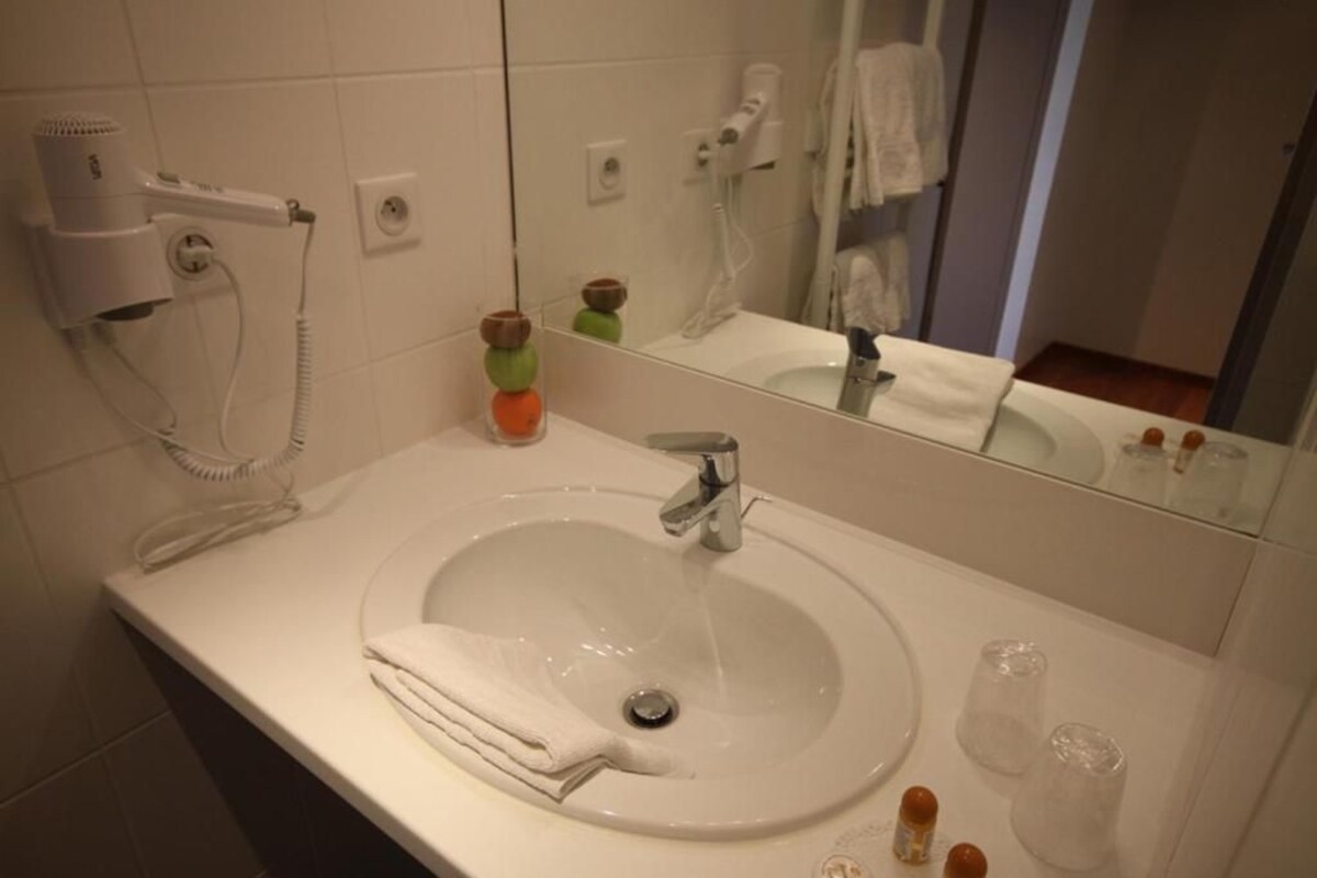 Bathroom | Shower, free toiletries, hair dryer, towels
