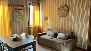 Deluxe appartement | Woonruimte | Flatscreentelevisie