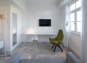 Luxe beddengoed, donsdekens, pillowtop-bedden, een minibar