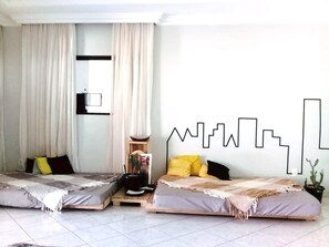 Blackout curtains, iron/ironing board, free WiFi, bed sheets