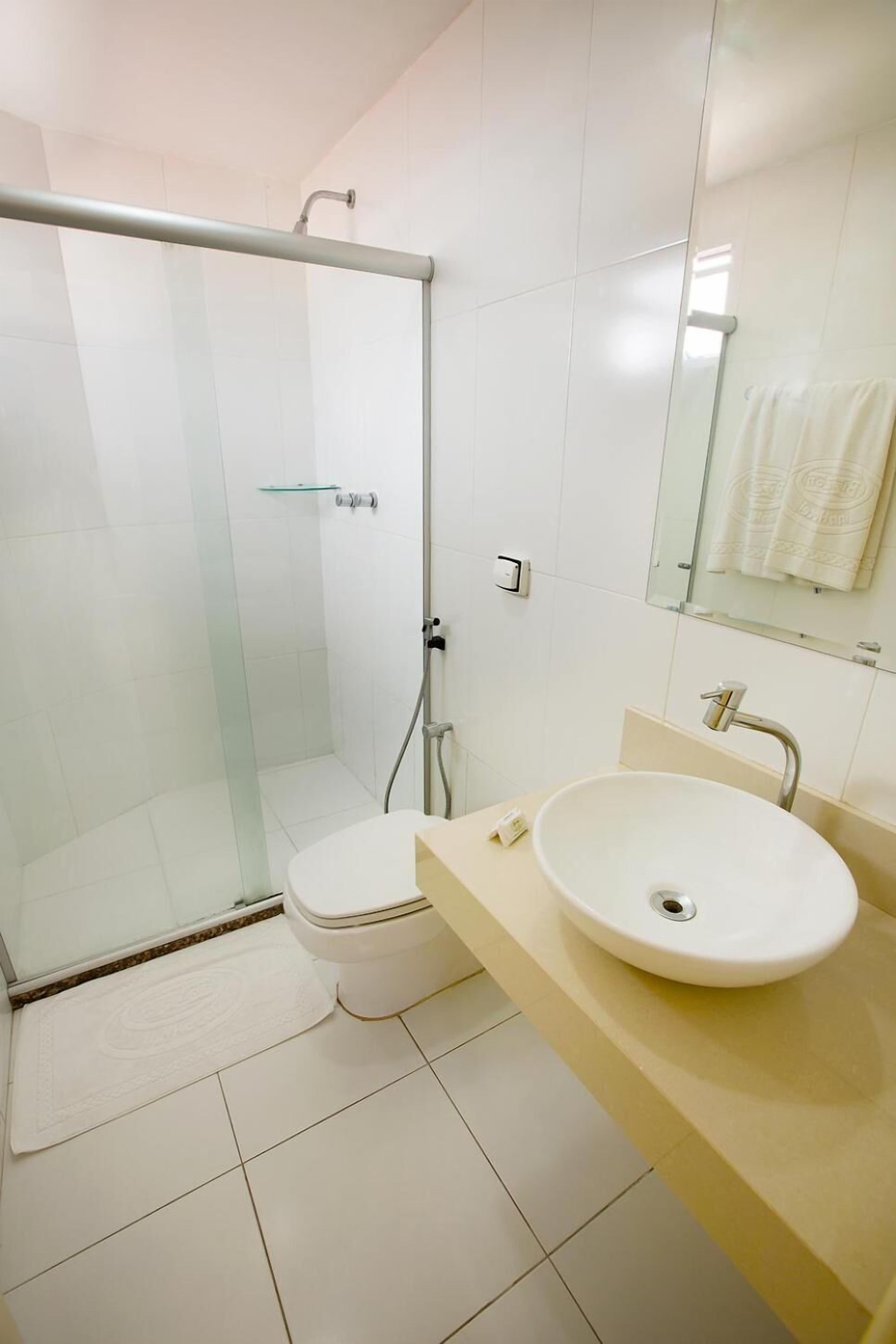 shower, towels, toilet paper