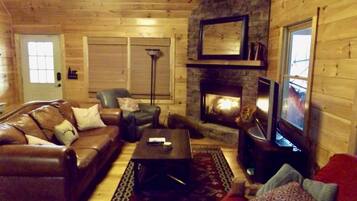 Smart TV, fireplace, DVD player, books