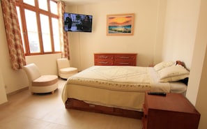 Suite estándar | Tabla de planchar con plancha, wifi gratis y ropa de cama