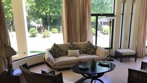 Deluxe House, 3 Bedrooms, Pool Access (In a Gated Community) | Living area | Flat-screen TV - Casa 104 Hermosa Palms (Jacó)