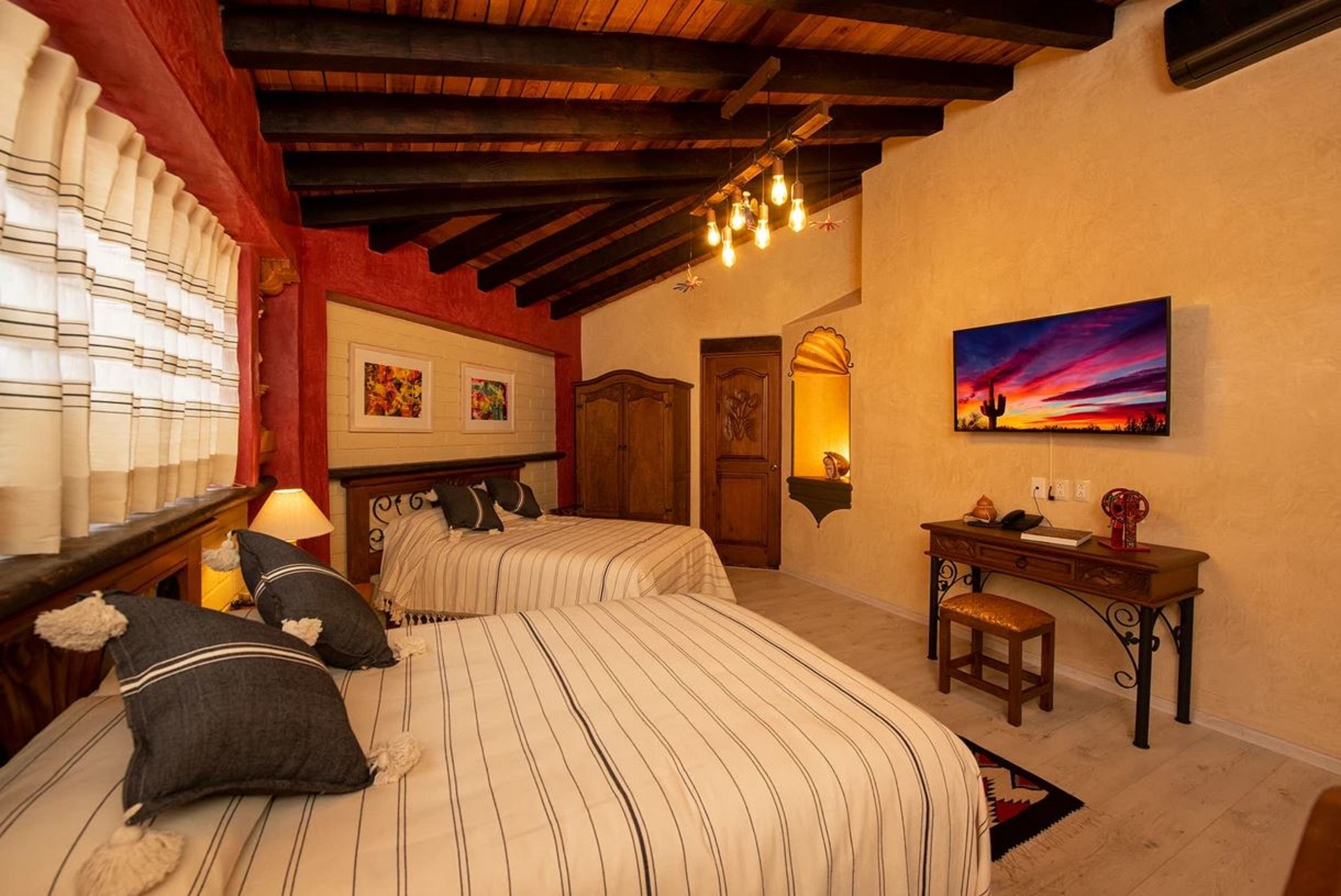 Superior dubbelrum - 2 dubbelsängar - privat badrum - utsikt mot trädgården | Utsikt från rummet