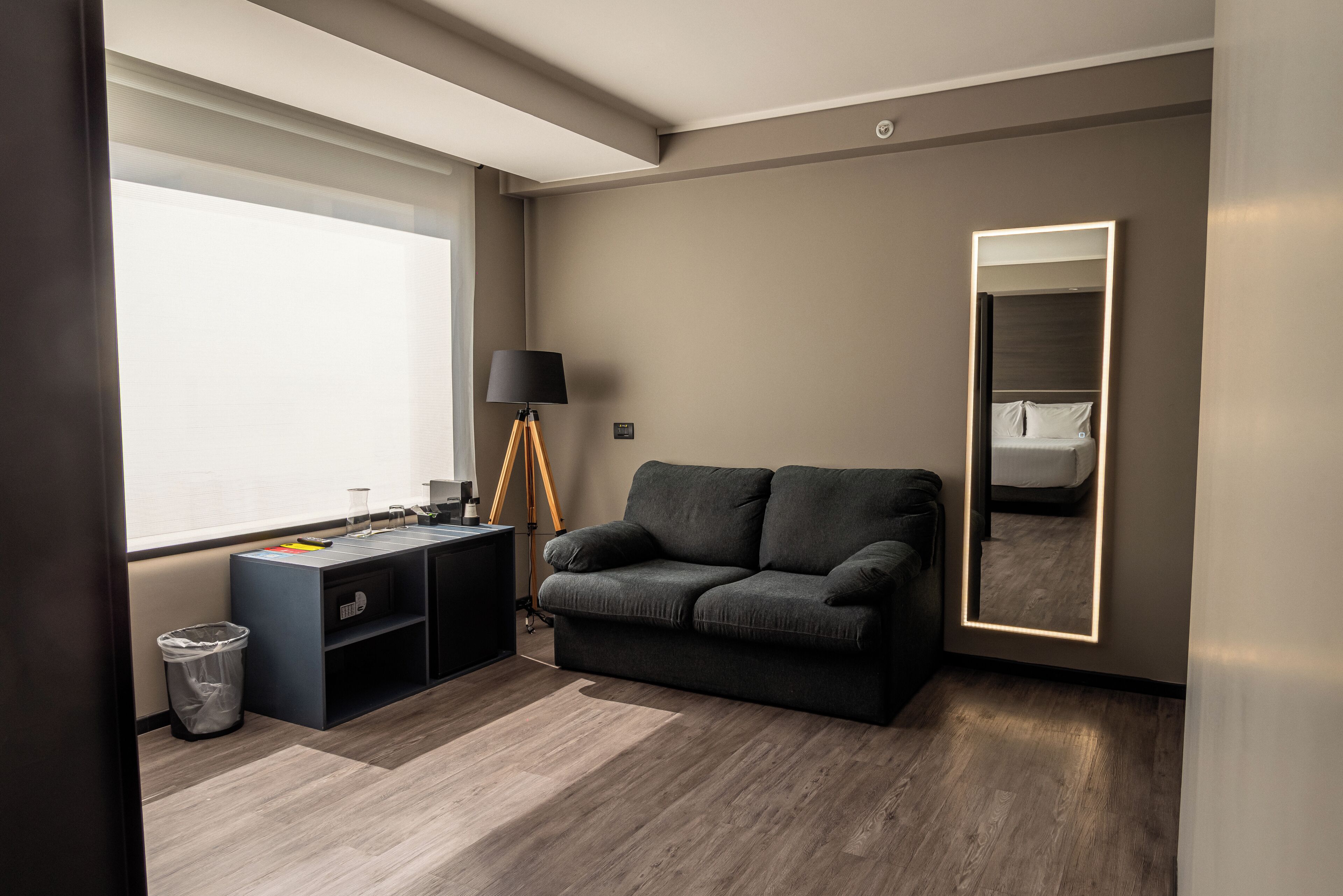 junior suite, 1 queen bed, accessible (mobility & hearing/roll-in shower) | living area | 49-inch flat-screen tv with cable channels, tv