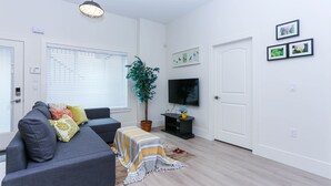 Economy Suite | Living room | TV - Tasteful 2 Bedroom Suite near Marine Gateway by Elevate Rooms (Vancouver)