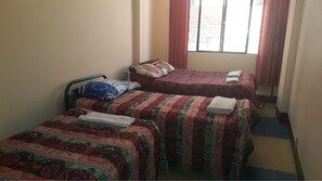 Habitación familiar, baño privado | Wifi gratis