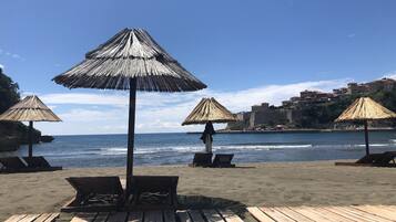 On the beach, beach towels