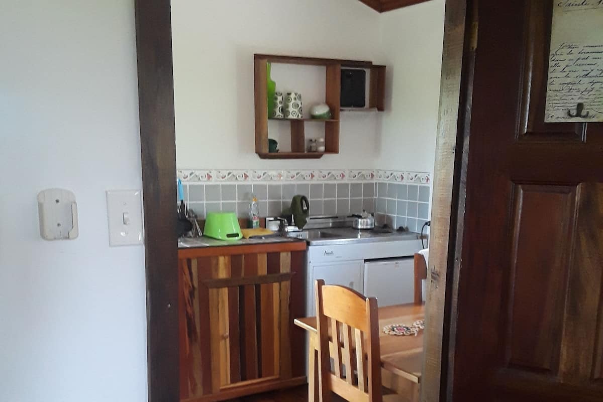 Fridge, stovetop, coffee/tea maker, cookware/dishes/utensils