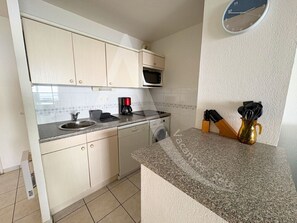 Fridge, microwave, dishwasher, coffee/tea maker