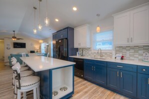 Fridge, microwave, oven, stovetop - Discover Oak Island at 2 Looney Dunes: a cozy 3-bedroom retreat for 7. (Oak Island)