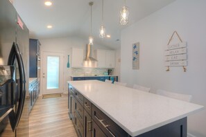 Fridge, microwave, oven, stovetop - Discover Oak Island at 2 Looney Dunes: a cozy 3-bedroom retreat for 7. (Oak Island)