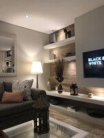 Luxury Villa, 1 Bedroom | Living room | 124-cm flat-screen TV with digital channels, LED TV, Netflix