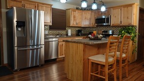 Fridge, microwave, oven, stovetop - A relaxing vacation rental home in the Black Hills of South Dakota (Rapid City)